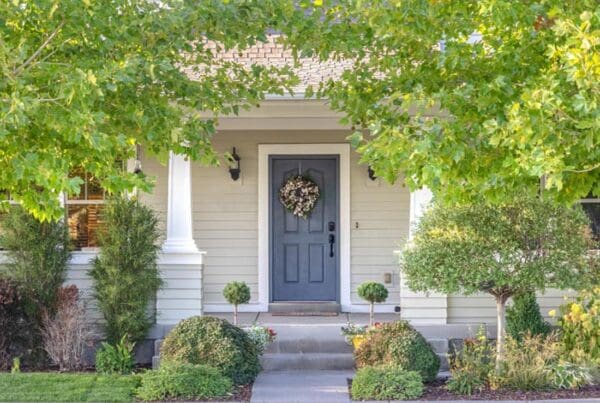 ErieSecure Home Bundles - Front of a House in Spring with Black Light Fixtures
